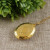 Медальон Камея кремовая Дама из стекла gold
